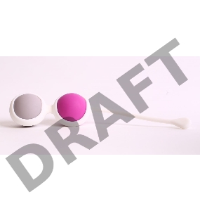 Вагинальные шарики разного веса в белом держателе