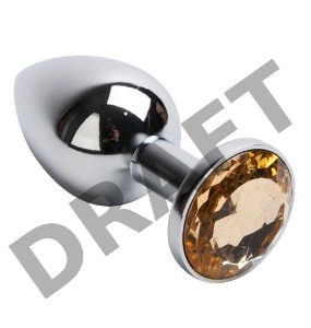 Серебристая анальная пробка с желтым кристаллом - 7,6 см.