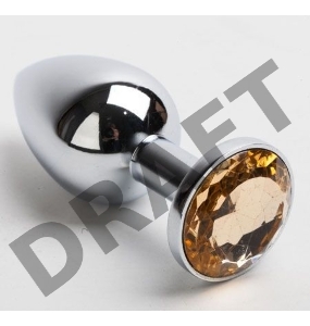 Серебристая анальная пробка с желтым кристаллом - 8,2 см.