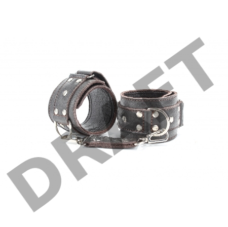 Коричневые кожаные оковы с клепками